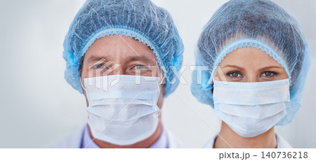 Face mask, doctors and portrait with surgery and safety gear for healthcare and wellness job. Hospital, ppe and people in clinic with working and health protocol in facility with care and staff Face mask, doctors and portrait with surgery and safety gear for healthcare and wellness job. Hospital, ppe and people in clinic with working and health protocol in facility with care and staff 140736218