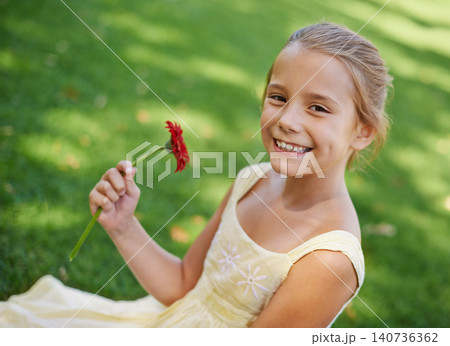 Child, portrait and smile with flower in garden for summer relaxing on holiday vacation, environment or plants. Female person, girl and face on backyard grass in Australia for spring, floral or happy Child, portrait and smile with flower in garden for summer relaxing on holiday vacation, environment or plants. Female person, girl and face on backyard grass in Australia for spring, floral or happy 140736362