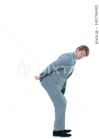 Businessman, portrait and back with pressure, workload or carrying invisible weight on a white studio background. Isolated man, employee or model holding something heavy for business on mockup space Businessman, portrait and back with pressure, workload or carrying invisible weight on a white studio background. Isolated man, employee or model holding something heavy for business on mockup space 140736485