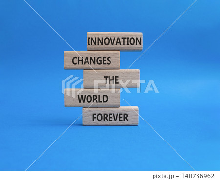 Innovation symbol. Wooden blocks with words Innovation changes the world forever. Beautiful blue background. Business and Innovation concept. Copy space 140736962