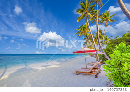 Beautiful tropical beach loungers umbrella turquoise. Palm trees bright white sand paradise. Sunny luxury resort summer escape, idyllic exotic island holiday getaway Beautiful tropical beach loungers umbrella turquoise. Palm trees bright white sand paradise. Sunny luxury resort summer escape, idyllic exotic island holiday getaway 140737288