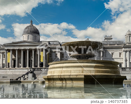Fountain and National Gallery Facade at Trafalgar Square in London on a Sunny Day Fountain and National Gallery Facade at Trafalgar Square in London on a Sunny Day 140737385