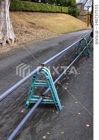 The MovablThe Movable metal fence forbids from approaching the walkway.e metal fence forbids from approaching the walkway. The MovablThe Movable metal fence forbids from approaching the walkway.e metal fence forbids from approaching the walkway. 140737533