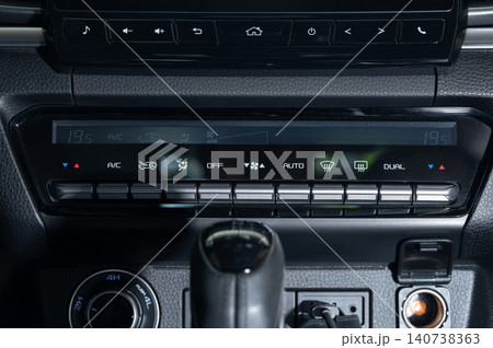 Car climate control system shows settings and temperature display Car climate control system shows settings and temperature display 140738363