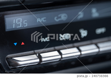 Control panel shows temperature settings in a car's climate system 140738366