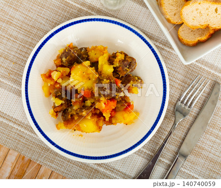 Ternera estofada con patata, braised beef with potato Ternera estofada con patata, braised beef with potato 140740059