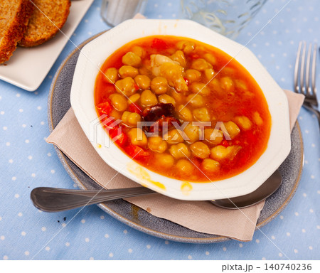 Garbanzos a la Riojana, chickpea stew with bacon, chorizo, vegetables Garbanzos a la Riojana, chickpea stew with bacon, chorizo, vegetables 140740236