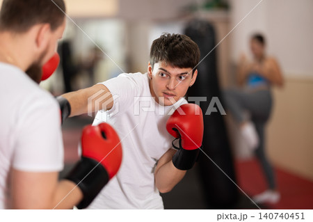 Guy sparring in boxing Guy sparring in boxing 140740451
