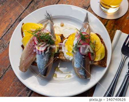 Traditional Dutch herring served on table in diner Traditional Dutch herring served on table in diner 140740626
