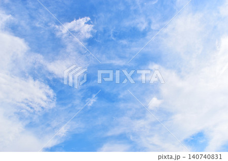 beautiful blue sky and white fluffy group of clouds with sunrise in the morning, natural background beautiful blue sky and white fluffy group of clouds with sunrise in the morning, natural background 140740831