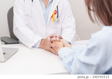 World hepatitis day awareness month, 28 July. doctor holding patient hand to comfort and support with empathy. Red and Yellow ribbon for Liver cancer, Jaundice, Cirrhosis, Failure, Enlarged World hepatitis day awareness month, 28 July. doctor holding patient hand to comfort and support with empathy. Red and Yellow ribbon for Liver cancer, Jaundice, Cirrhosis, Failure, Enlarged 140743513