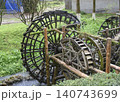 Wooden water wheel system on a stream in Yellow Dragon Park in the mountains near Zhangjiajie, China 140743699