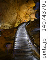 Winding stone staircase in famous huge Yellow Dragon Cave in the mountains near Zhangjiajie, China 140743701