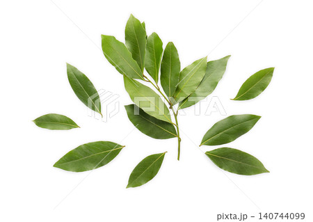 Fresh bay leaves arranged in an artistic layout for culinary use. Herb decoration concept, PNG 140744099