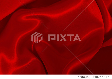 Red fabric cloth texture for background and design art work, beautiful crumpled pattern of silk or linen. Red fabric cloth texture for background and design art work, beautiful crumpled pattern of silk or linen. 140744877