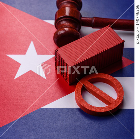 The cargo container ban on the Cuba flag as a conceptual backdrop. The cargo container embargo The cargo container ban on the Cuba flag as a conceptual backdrop. The cargo container embargo 140746266