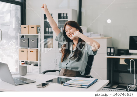 Woman experiencing neck pain due to office work Woman experiencing neck pain due to office work 140746617