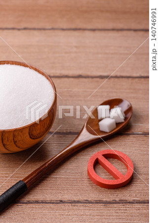 The sugar ban sign as a concept to stop the problem of diabetes and obesity. The sugar ban sign 140746991