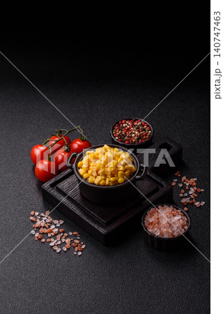 Golden, sweet canned corn kernels or maize for salads and vegetarian dishes. Canned corn Golden, sweet canned corn kernels or maize for salads and vegetarian dishes. Canned corn 140747463