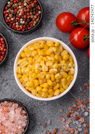 Golden, sweet canned corn kernels or maize for salads and vegetarian dishes. Canned corn Golden, sweet canned corn kernels or maize for salads and vegetarian dishes. Canned corn 140747477
