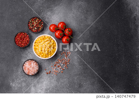 Golden, sweet canned corn kernels or maize for salads and vegetarian dishes. Canned corn Golden, sweet canned corn kernels or maize for salads and vegetarian dishes. Canned corn 140747479