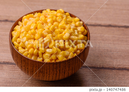Golden, sweet canned corn kernels or maize for salads and vegetarian dishes. Canned corn Golden, sweet canned corn kernels or maize for salads and vegetarian dishes. Canned corn 140747486
