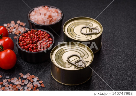 A metal tin can of meat, fish, or dog or cat food. A tin can of food A metal tin can of meat, fish, or dog or cat food. A tin can of food 140747998