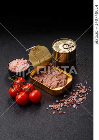 Fish, canned tuna chunks in brine for sandwiches and salads. Canned tuna Fish, canned tuna chunks in brine for sandwiches and salads. Canned tuna 140748014