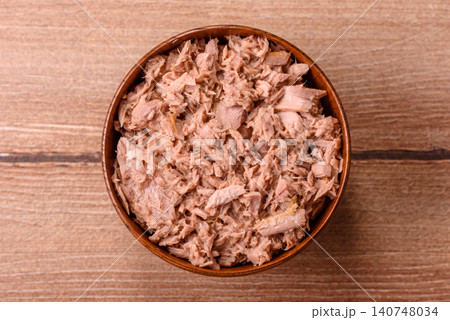 Fish, canned tuna chunks in brine for sandwiches and salads. Canned tuna Fish, canned tuna chunks in brine for sandwiches and salads. Canned tuna 140748034