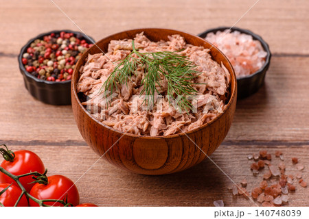 Fish, canned tuna chunks in brine for sandwiches and salads. Canned tuna 140748039