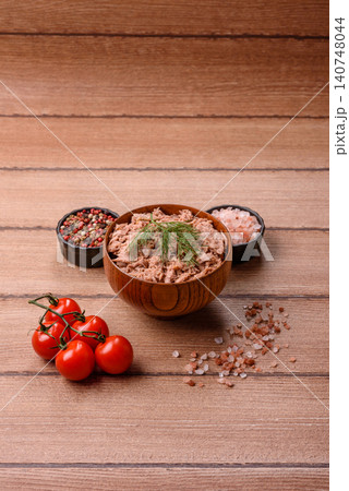 Fish, canned tuna chunks in brine for sandwiches and salads. Canned tuna Fish, canned tuna chunks in brine for sandwiches and salads. Canned tuna 140748044