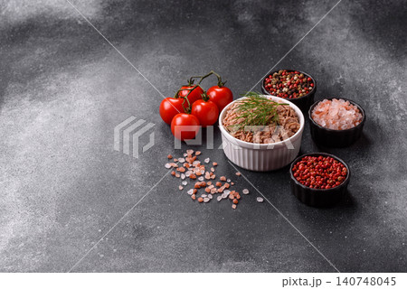 Fish, canned tuna chunks in brine for sandwiches and salads. Canned tuna 140748045