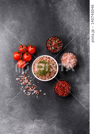 Fish, canned tuna chunks in brine for sandwiches and salads. Canned tuna Fish, canned tuna chunks in brine for sandwiches and salads. Canned tuna 140748046