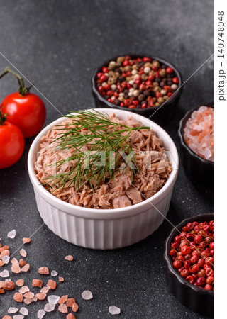 Fish, canned tuna chunks in brine for sandwiches and salads. Canned tuna Fish, canned tuna chunks in brine for sandwiches and salads. Canned tuna 140748048