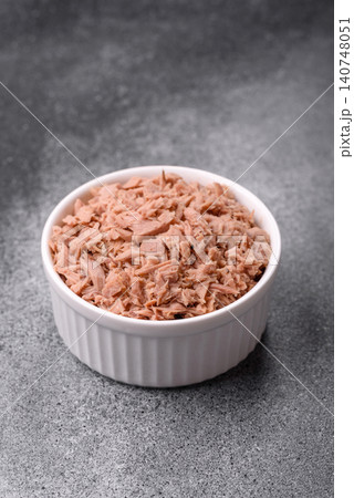Fish, canned tuna chunks in brine for sandwiches and salads. Canned tuna Fish, canned tuna chunks in brine for sandwiches and salads. Canned tuna 140748051