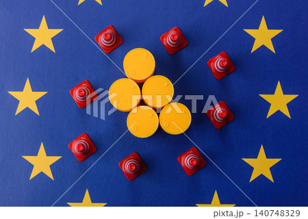 The cargo container ban on the EU flag as a conceptual backdrop . The cargo container embargo The cargo container ban on the EU flag as a conceptual backdrop . The cargo container embargo 140748329