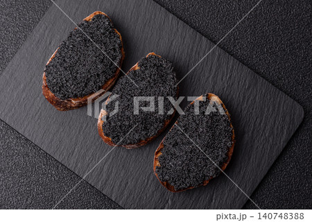 Black caviar from beluga or sturgeon, an expensive delicacy for sandwiches. Black caviar Black caviar from beluga or sturgeon, an expensive delicacy for sandwiches. Black caviar 140748388