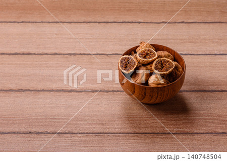 Dried whole fig as an ingredient for sweet desserts. Dried figs Dried whole fig as an ingredient for sweet desserts. Dried figs 140748504