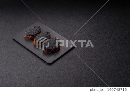 Black caviar from beluga or sturgeon, an expensive delicacy for sandwiches. Black caviar Black caviar from beluga or sturgeon, an expensive delicacy for sandwiches. Black caviar 140748716