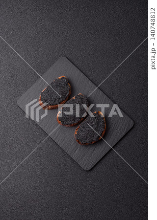 Black caviar from beluga or sturgeon, an expensive delicacy for sandwiches. Black caviar Black caviar from beluga or sturgeon, an expensive delicacy for sandwiches. Black caviar 140748812