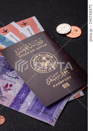 Qatar passport for travelling, flying and doing business. Qatari document Qatar passport for travelling, flying and doing business. Qatari document 140748975