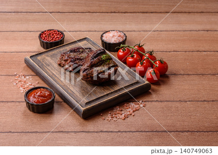 Beef mignon steak, rare, meat grilled with salt and spices. Beef steak Beef mignon steak, rare, meat grilled with salt and spices. Beef steak 140749063