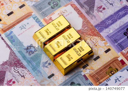 Qatari gold bars or ingots as a tool for balance, financial investment. Qatari gold bars 140749077