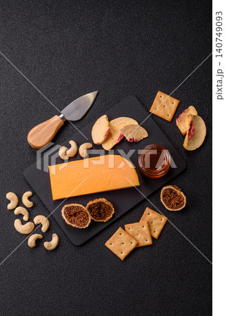 Hard yellow cheddar cheese for sandwiches or pasta. Cheddar cheese Hard yellow cheddar cheese for sandwiches or pasta. Cheddar cheese 140749093