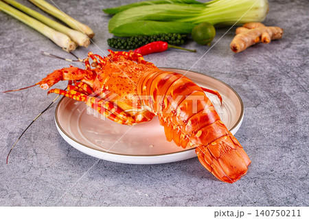 Cooked lobster on plate with lemongrass ginger and chili 140750211