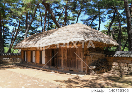Korean traditional thatched roof house in Cheongryeongpo, Yeongwol-gun, Gangwon-do, South Korea. Korean traditional thatched roof house in Cheongryeongpo, Yeongwol-gun, Gangwon-do, South Korea. 140750506