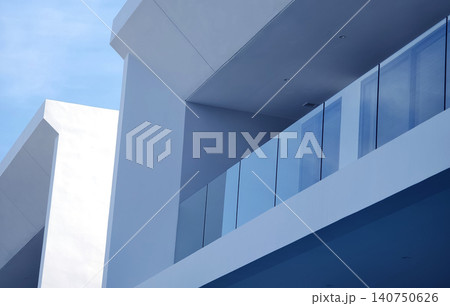 Modern building with open design. Stylish home with geometric and sunlit features Modern building with open design. Stylish home with geometric and sunlit features 140750626