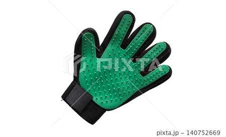 Green pet grooming glove isolated on transparent background. Silicone brush accessory for removing loose fur, massaging skin and everyday coat care for cats and dogs. Green pet grooming glove isolated on transparent background. Silicone brush accessory for removing loose fur, massaging skin and everyday coat care for cats and dogs. 140752669