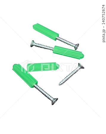 Metal screws and bright green plastic wall anchors for construction isolated on transparent background, concept of home repair and hardware equipment 140752674