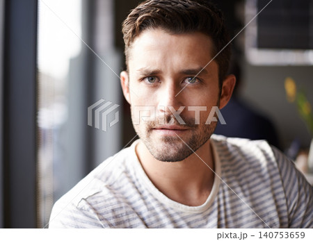 Handsome man, portrait and serious face at cafe for morning, ambition or aspiration at indoor restaurant. Attractive or young male person with beard in relax, casual clothing or style at coffee shop Handsome man, portrait and serious face at cafe for morning, ambition or aspiration at indoor restaurant. Attractive or young male person with beard in relax, casual clothing or style at coffee shop 140753659